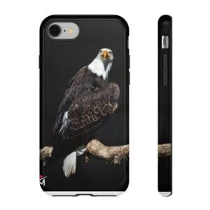 Phone case featuring a detailed bald eagle perched on a branch.