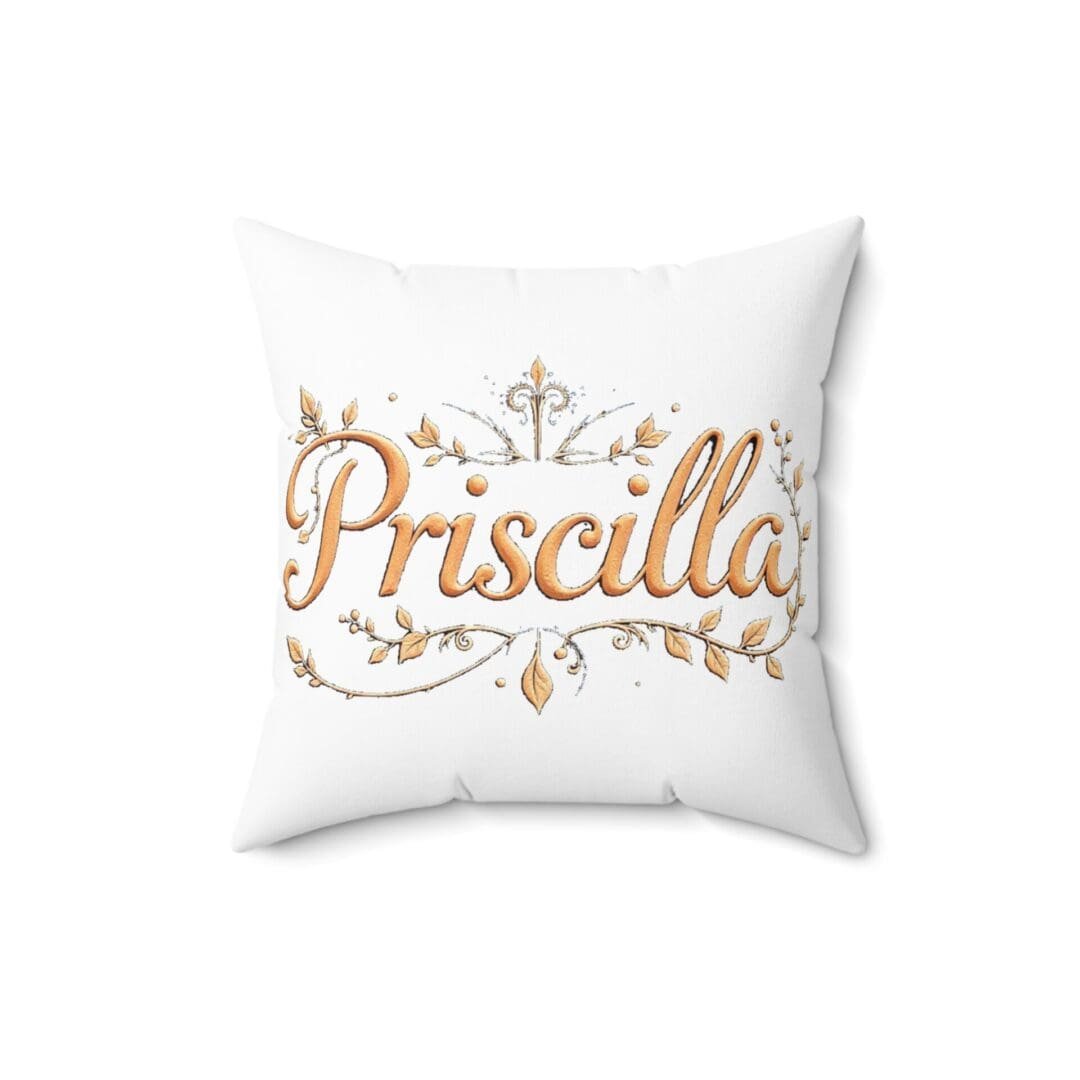 White decorative pillow with gold text reading 'Priscilla'.