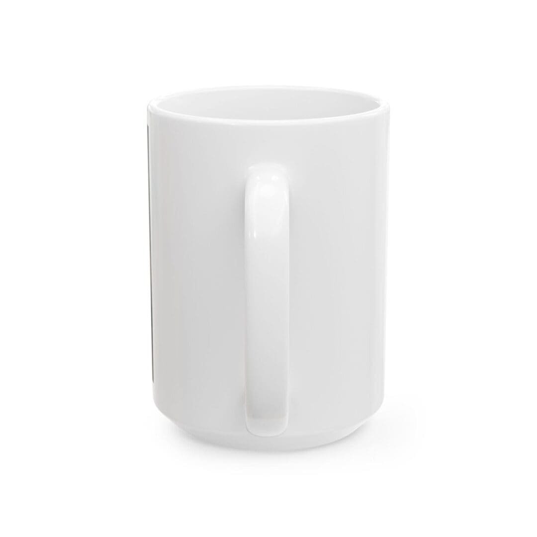 A plain white ceramic mug with a handle.