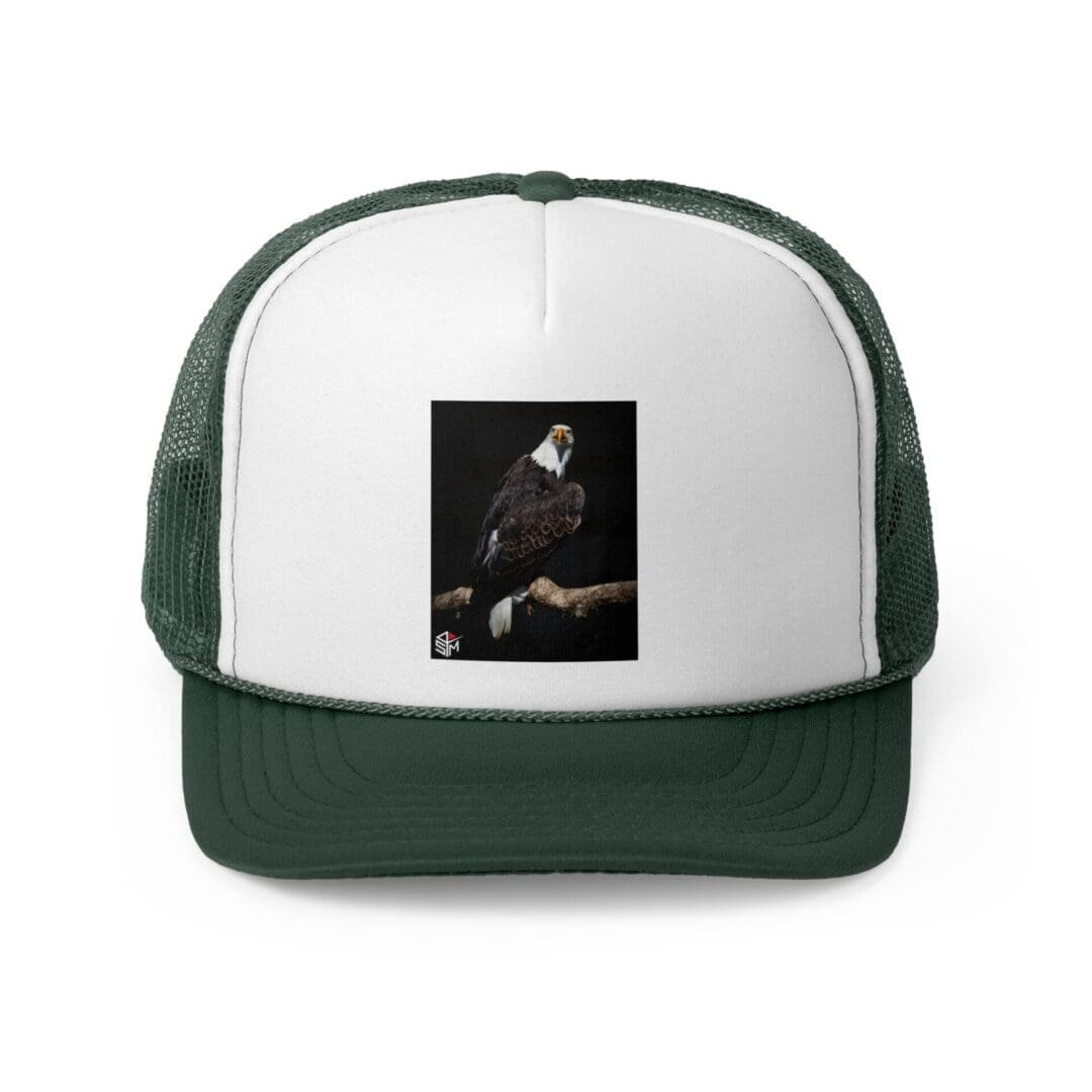 White and green trucker hat with a dark, artistic image on the front.