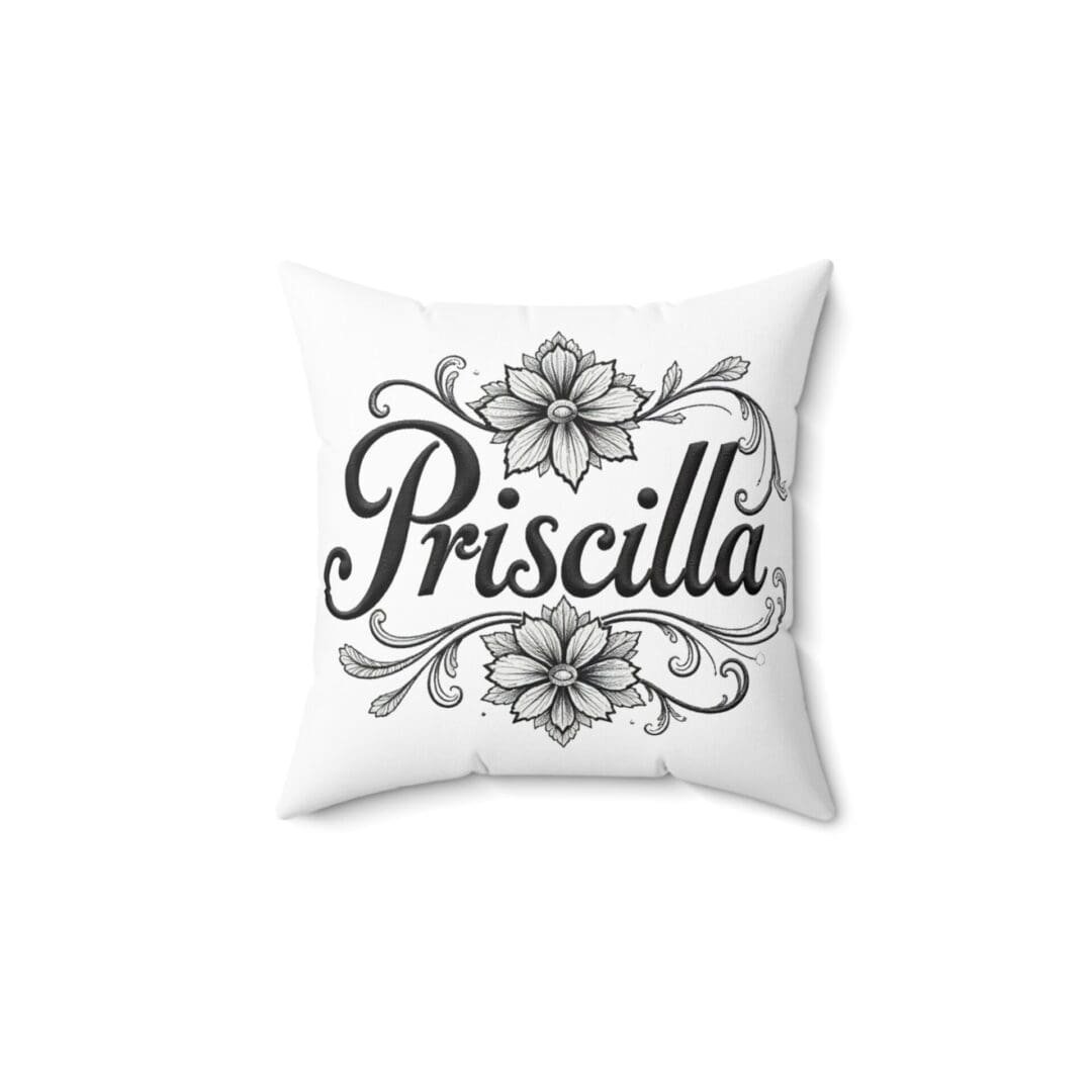 White pillow with elegant black floral design and 'Priscilla' text.