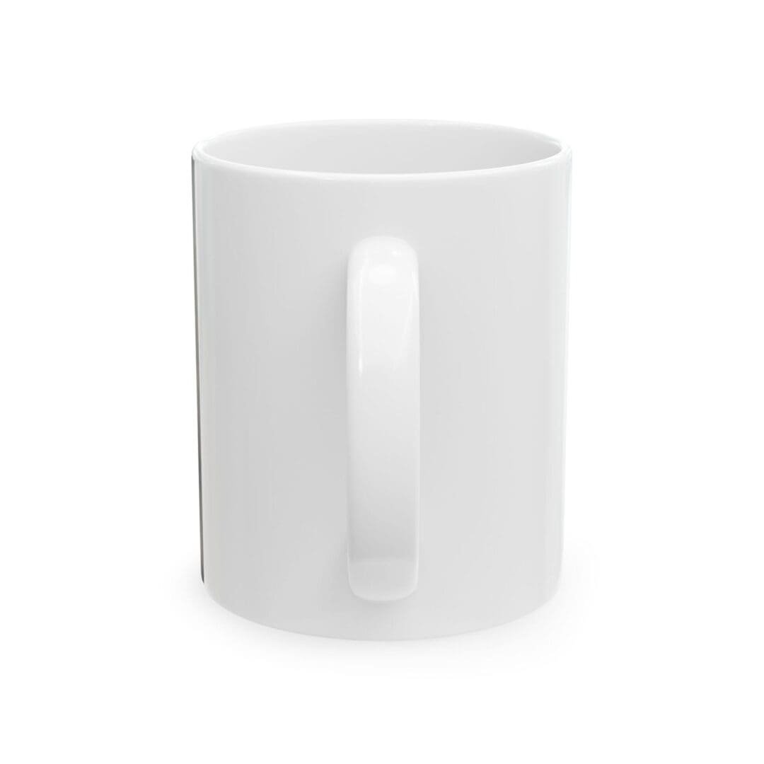 Plain white ceramic mug with a handle.
