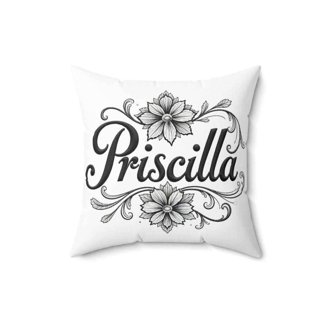 White pillow with floral design and name Priscilla.